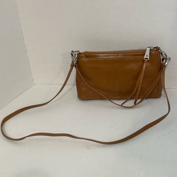 HOBO Darcy Tan polished Leather in the color truffle Crossbody Bag - Picture 1 of 16
